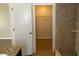 Bathroom with shower, closet, and vanity at 6802 Seaview Way, Tampa, FL 33615