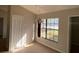 Bright dining area with large window and chandelier at 6802 Seaview Way, Tampa, FL 33615