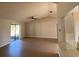 Living room features high ceilings and a ceiling fan at 6802 Seaview Way, Tampa, FL 33615