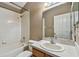 Clean bathroom featuring a shower/tub combo, vanity, and mirror at 6944 Runner Oak Dr, Wesley Chapel, FL 33545