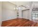 Spacious dining area featuring hardwood floors and chandelier at 6944 Runner Oak Dr, Wesley Chapel, FL 33545