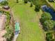 Fenced dog park with benches and shade structure at 6944 Runner Oak Dr, Wesley Chapel, FL 33545