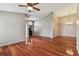 Bright living room with hardwood floors and high ceilings at 6944 Runner Oak Dr, Wesley Chapel, FL 33545