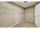 Spacious walk-in closet with wire shelving at 6944 Runner Oak Dr, Wesley Chapel, FL 33545