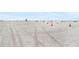 Expansive beach with tire tracks and lifeguard stand at 710 Seminole St, Clearwater, FL 33755