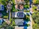 Aerial view of a home with solar panels on the roof at 818 W Adalee St, Tampa, FL 33603