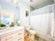 Clean bathroom with single vanity, toilet, and shower at 818 W Adalee St, Tampa, FL 33603