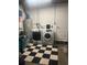 Convenient laundry room with washer, dryer, and storage at 895 64Th S Ave, St Petersburg, FL 33705