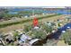 Aerial view of waterfront home with location marker at 9934 Peninsular Dr, Gibsonton, FL 33534