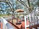 Relaxing deck with seating area, perfect for outdoor enjoyment at 9934 Peninsular Dr, Gibsonton, FL 33534