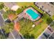 Community pool and surrounding area from an aerial perspective at 10112 Haverhill Ridge Dr, Riverview, FL 33578