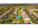 Aerial view of community with pool and surrounding homes at 10112 Haverhill Ridge Dr, Riverview, FL 33578