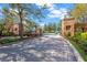 Gated community entrance with brick pillars and landscaping at 10112 Haverhill Ridge Dr, Riverview, FL 33578