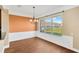 Bright dining area with hardwood floors, view, and chandelier at 10112 Haverhill Ridge Dr, Riverview, FL 33578