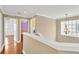 Upstairs hallway with doors to bedrooms and laundry at 10112 Haverhill Ridge Dr, Riverview, FL 33578