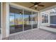 Screened porch with sliding doors and lake view at 10112 Haverhill Ridge Dr, Riverview, FL 33578