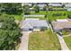 Aerial view showcasing a remodeled house and its surrounding neighborhood at 10971 90Th Ave, Seminole, FL 33772