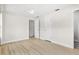 Bright bedroom with light wood flooring and double closets at 10971 90Th Ave, Seminole, FL 33772