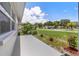 Inviting front porch with landscaping at 10971 90Th Ave, Seminole, FL 33772
