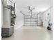 Clean and spacious garage with an overhead door at 10971 90Th Ave, Seminole, FL 33772