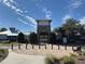 Community clubhouse featuring a stone facade and landscaping at 12202 Legacy Bright St, Riverview, FL 33578