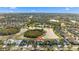 Bird's eye view of a house by a lake in a residential area at 12311 Silton Peace Dr, Riverview, FL 33579