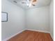 Spacious bedroom with hardwood floors and a ceiling fan at 12311 Silton Peace Dr, Riverview, FL 33579