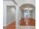 Bright and airy entryway with hardwood floors and high ceilings at 12311 Silton Peace Dr, Riverview, FL 33579