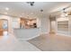 Open concept kitchen with breakfast bar and tile flooring at 12311 Silton Peace Dr, Riverview, FL 33579