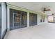 Large screened porch, perfect for relaxing and enjoying the outdoors at 12311 Silton Peace Dr, Riverview, FL 33579