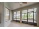Spacious screened porch overlooking a lush green backyard at 12311 Silton Peace Dr, Riverview, FL 33579