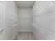 Spacious walk-in closet with wire shelving at 12311 Silton Peace Dr, Riverview, FL 33579