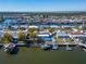 Wide aerial view of waterfront home and neighborhood at 12620 3Rd Isle, Hudson, FL 34667