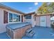 Relax in this outdoor hot tub, complete with wooden steps and enclosure at 12620 3Rd Isle, Hudson, FL 34667