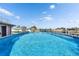 Stunning above ground pool overlooking the canal at 12620 3Rd Isle, Hudson, FL 34667