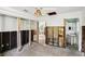 Bathroom undergoing renovation, showing exposed plumbing and walls at 128 Bay Plz, Treasure Island, FL 33706