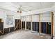 Unfinished bedroom with exposed framing and closet structures at 128 Bay Plz, Treasure Island, FL 33706