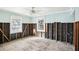 Unfinished bedroom undergoing renovation, showing exposed studs at 128 Bay Plz, Treasure Island, FL 33706