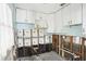 A kitchen undergoing renovation, with exposed plumbing and framing at 128 Bay Plz, Treasure Island, FL 33706