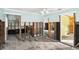 Renovation project: gutted living room with exposed framing and flooring at 128 Bay Plz, Treasure Island, FL 33706