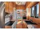 Kitchen with stainless steel appliances and wood cabinets at 130 4Th N Ave # 414, St Petersburg, FL 33701