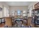 Living room with hardwood floors, comfortable seating, and large windows at 130 4Th N Ave # 414, St Petersburg, FL 33701