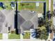 Aerial view showing home's backyard, playground, and surrounding neighborhood at 13458 Graham Yarden Dr, Riverview, FL 33579