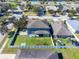Aerial view showcasing home's backyard, patio, and fence at 13458 Graham Yarden Dr, Riverview, FL 33579