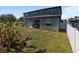 Spacious backyard with grassy area at 13458 Graham Yarden Dr, Riverview, FL 33579
