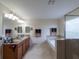 Bathroom with double vanity, soaking tub, and walk-in shower at 13458 Graham Yarden Dr, Riverview, FL 33579