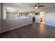 Large bedroom with hardwood floors and ceiling fan at 13458 Graham Yarden Dr, Riverview, FL 33579