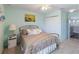 Light and airy bedroom with double bed and built-in closet at 13458 Graham Yarden Dr, Riverview, FL 33579