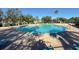 Inviting kidney-shaped community pool at 13458 Graham Yarden Dr, Riverview, FL 33579