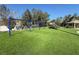Community playground with swings and playset at 13458 Graham Yarden Dr, Riverview, FL 33579